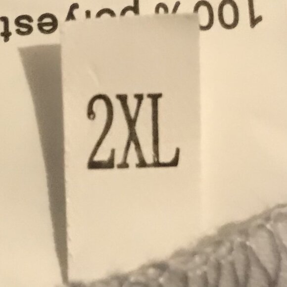 Long sleeved 2X Tee shirt with patterns, folds, and buttons in blues. - Picture 9 of 11